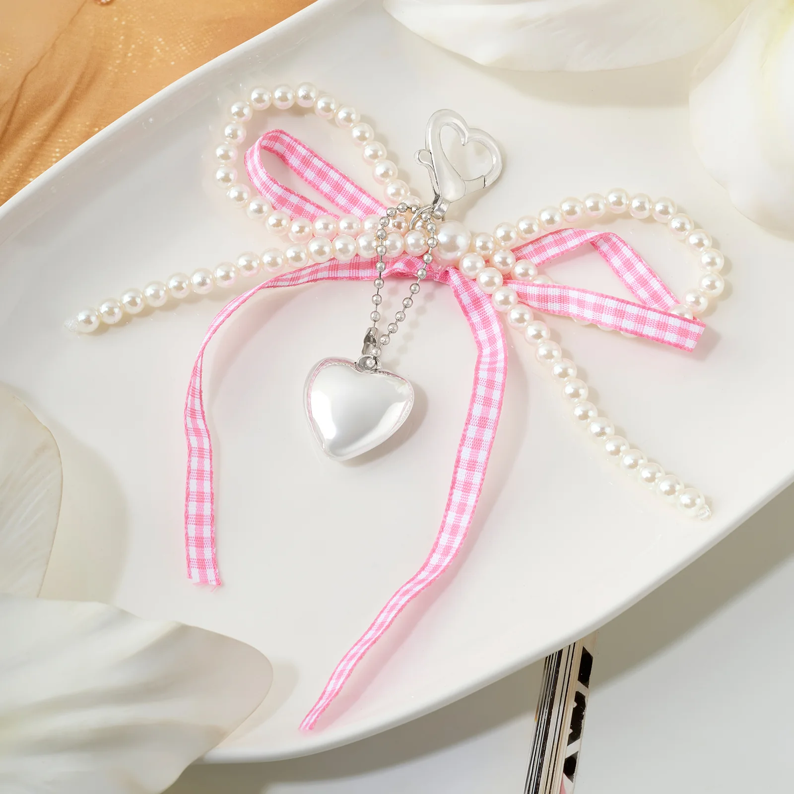 A Bow-Crush Pink Bag Charm