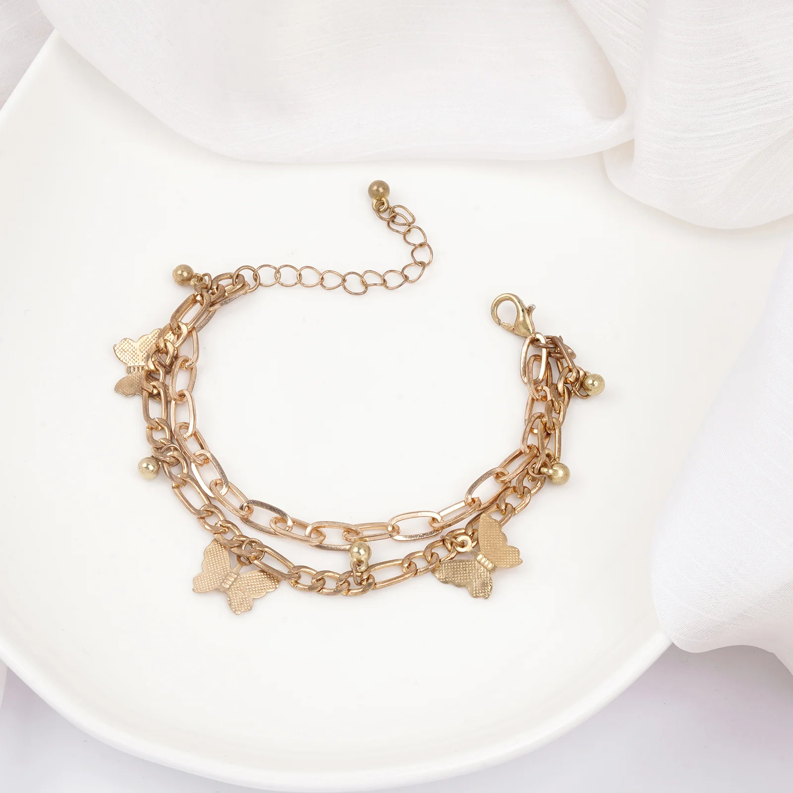 Bewitched Cystine Gold Butterfly Charm Bracelet