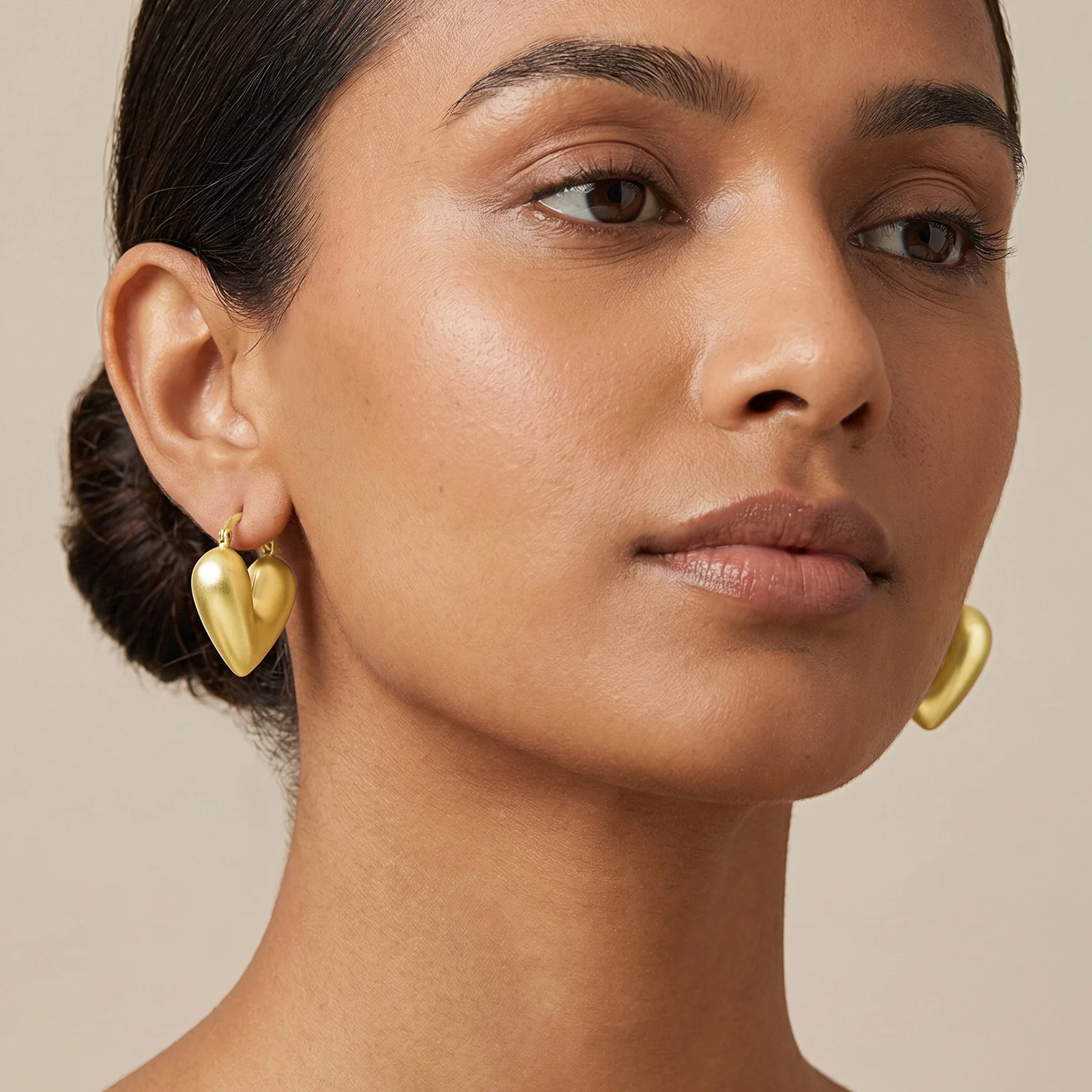 Flor Heart Shaped Gold Love Earrings - Image 2